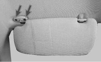 Замена показана на примере левого козырька, правый козырек заменяют аналогично.