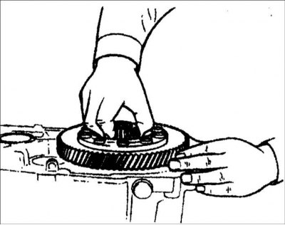 1. Установите дифференциал в картер коробки передач.