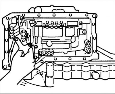20. Вывярніце ніт і зніміце трымальнік рычага паркоўкі.