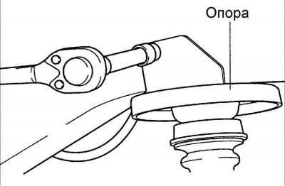 17. Снимите верхнюю опору цилиндрической пружины.