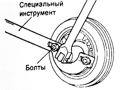 С помощью специального инструмента зафиксируйте коленчатый вал от проворота и отверните болт…